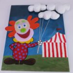 clown flying balloons